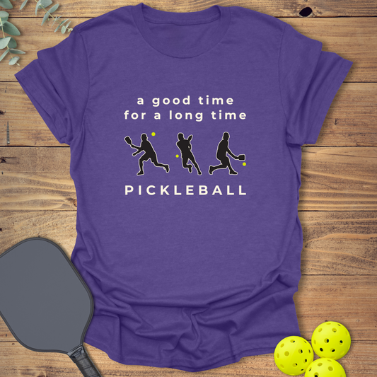 Unisex pickleball t-shirt with the slogan “A Good Time for a Long Time” and player silhouettes, shown on a heather purple tee.