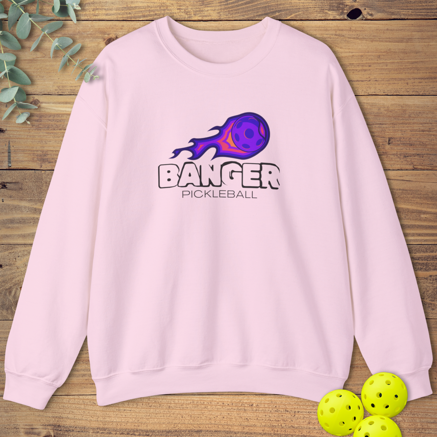 pickleball sweatshirt with a banger design in light pink