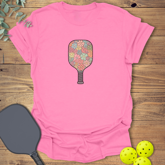 graphic pickleball t-shirt with a flower pickleball paddle in bright pink