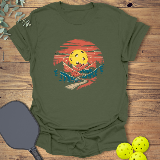 fun pickleball t-shirt with a mountain sunset design in green