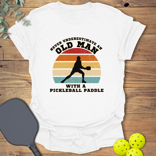 Funny pickleball t-shirt with a retro-style design in white
