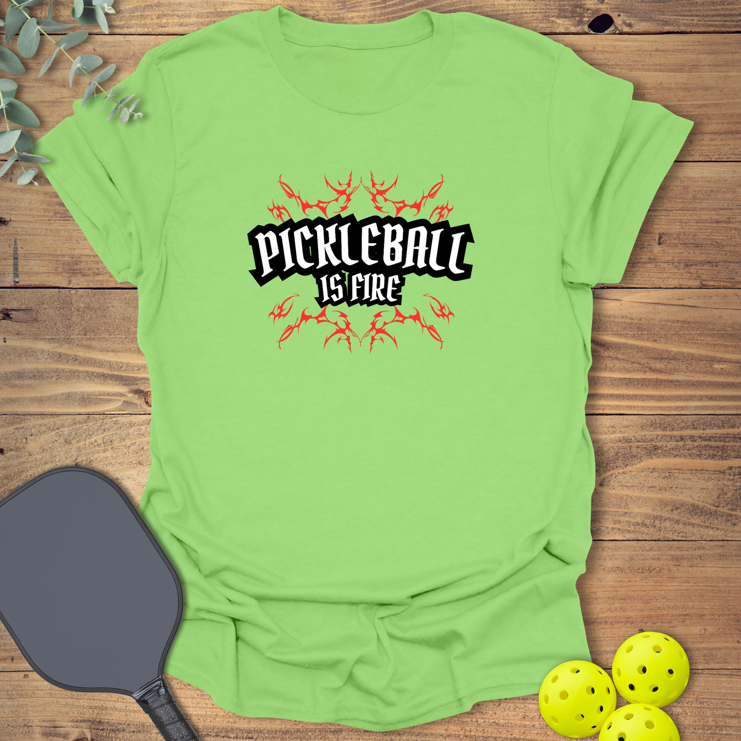 graphic pickleball t-shirt with a fire design in lime green