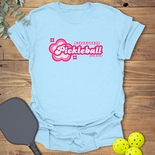 fun pickleball t-shirt with a retro-style design in light blue