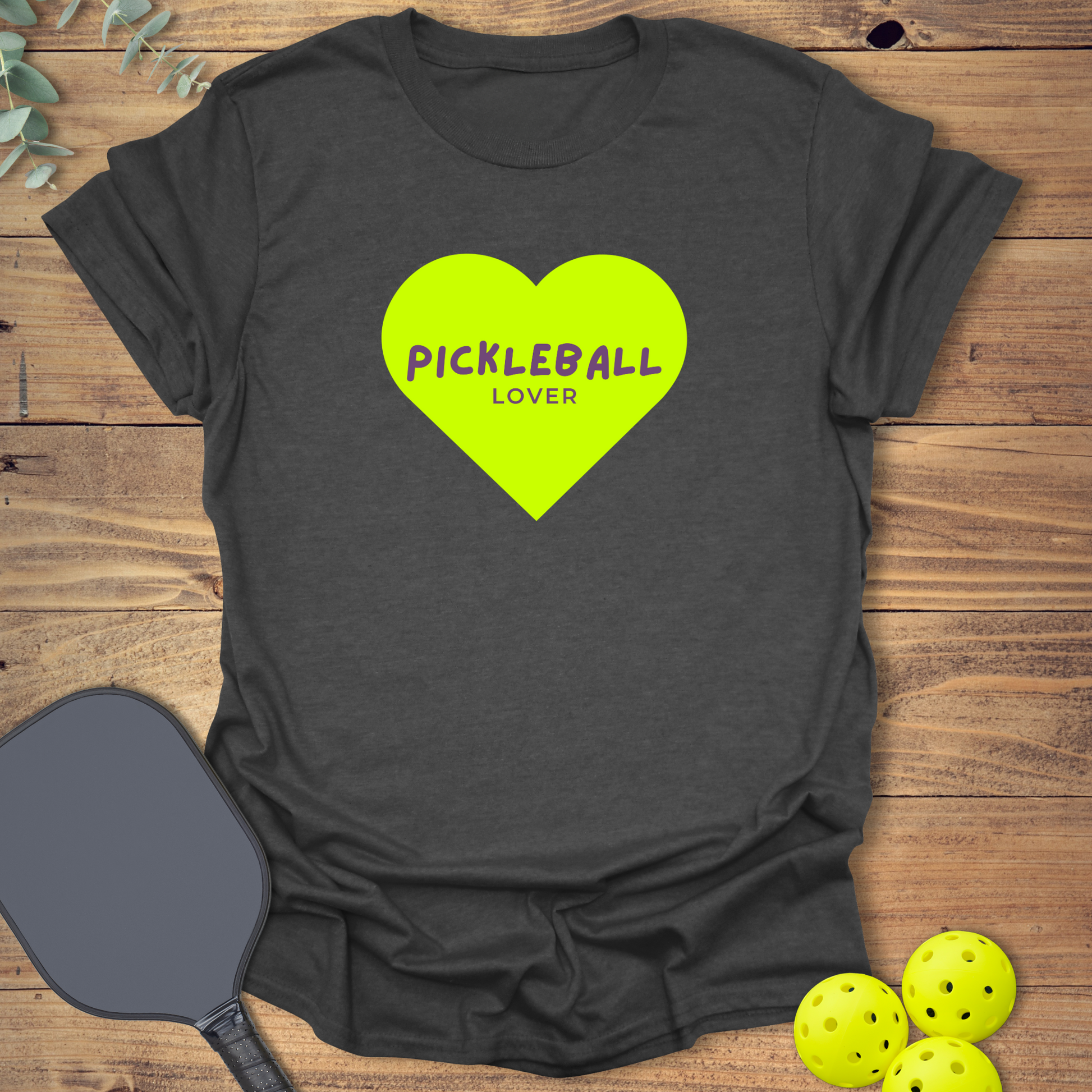 Love pickleball t-shirt featuring a neon green heart in dark heather grey