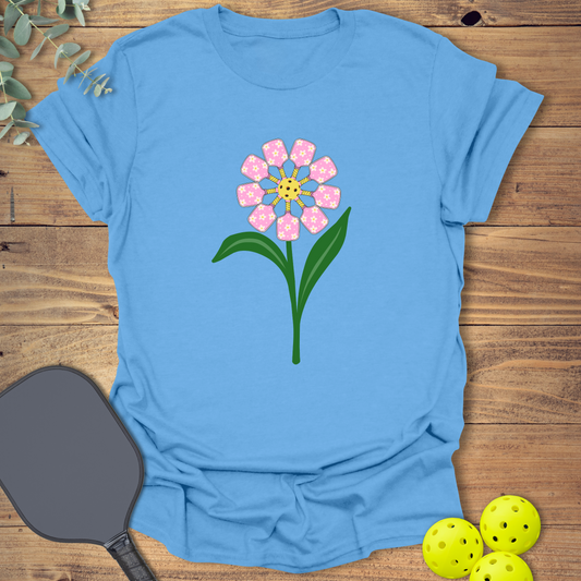 Fun pickleball t-shirt with a bright flower design in blue