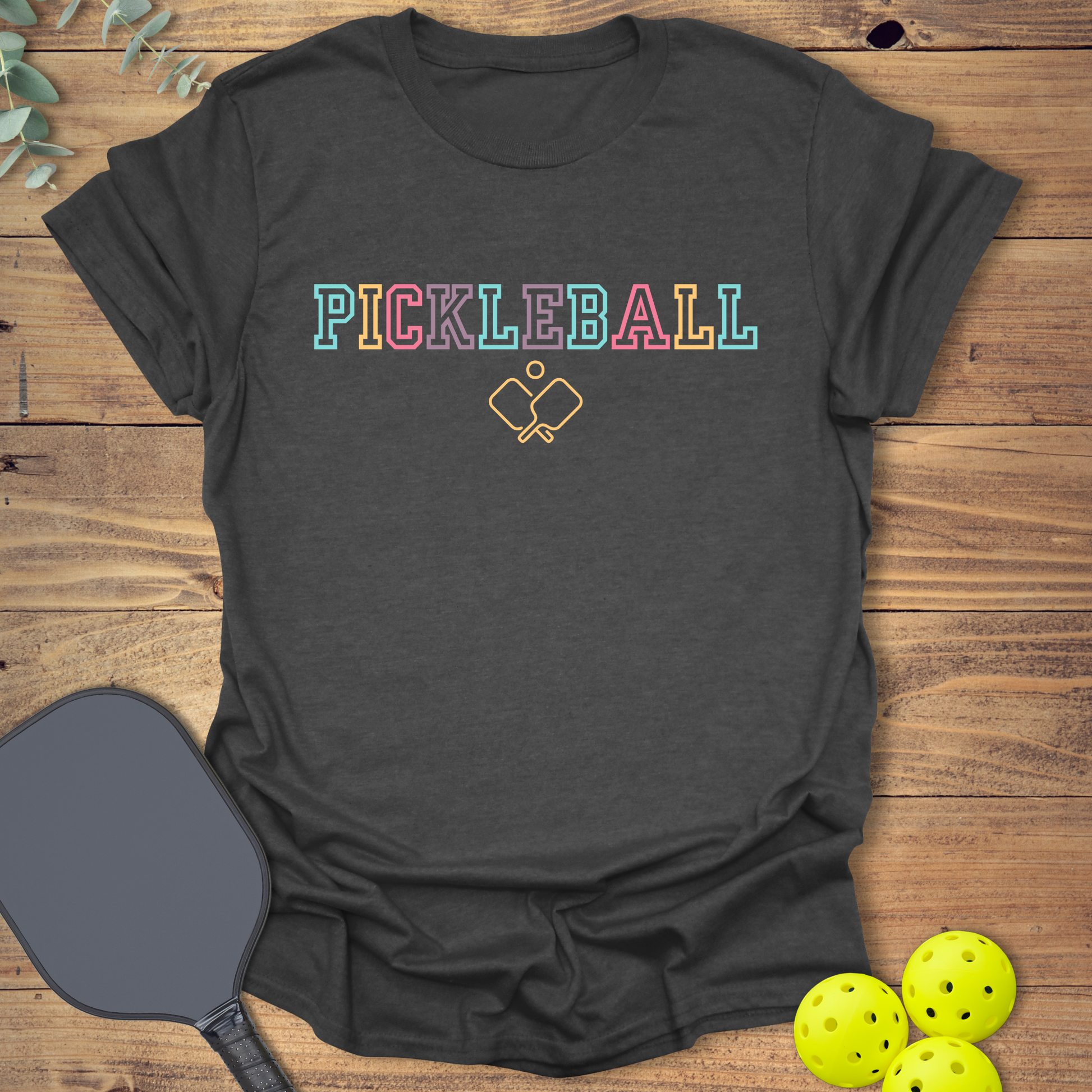 colorful pickleball t-shirt with varsity-style saying in grey