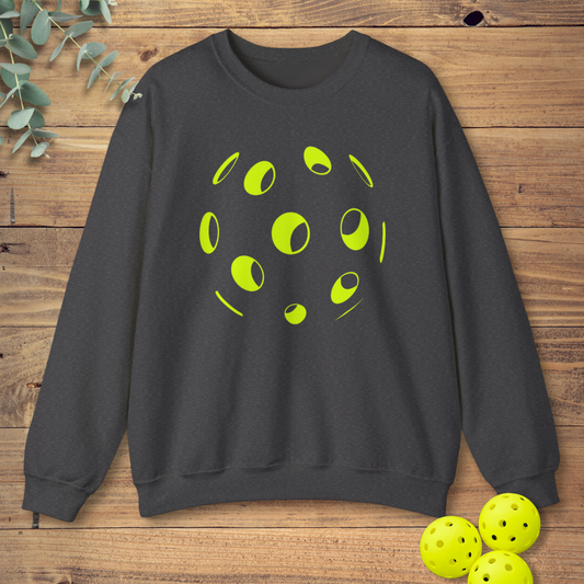 pickleball sweatshirt with a simple pickleball design in dark grey