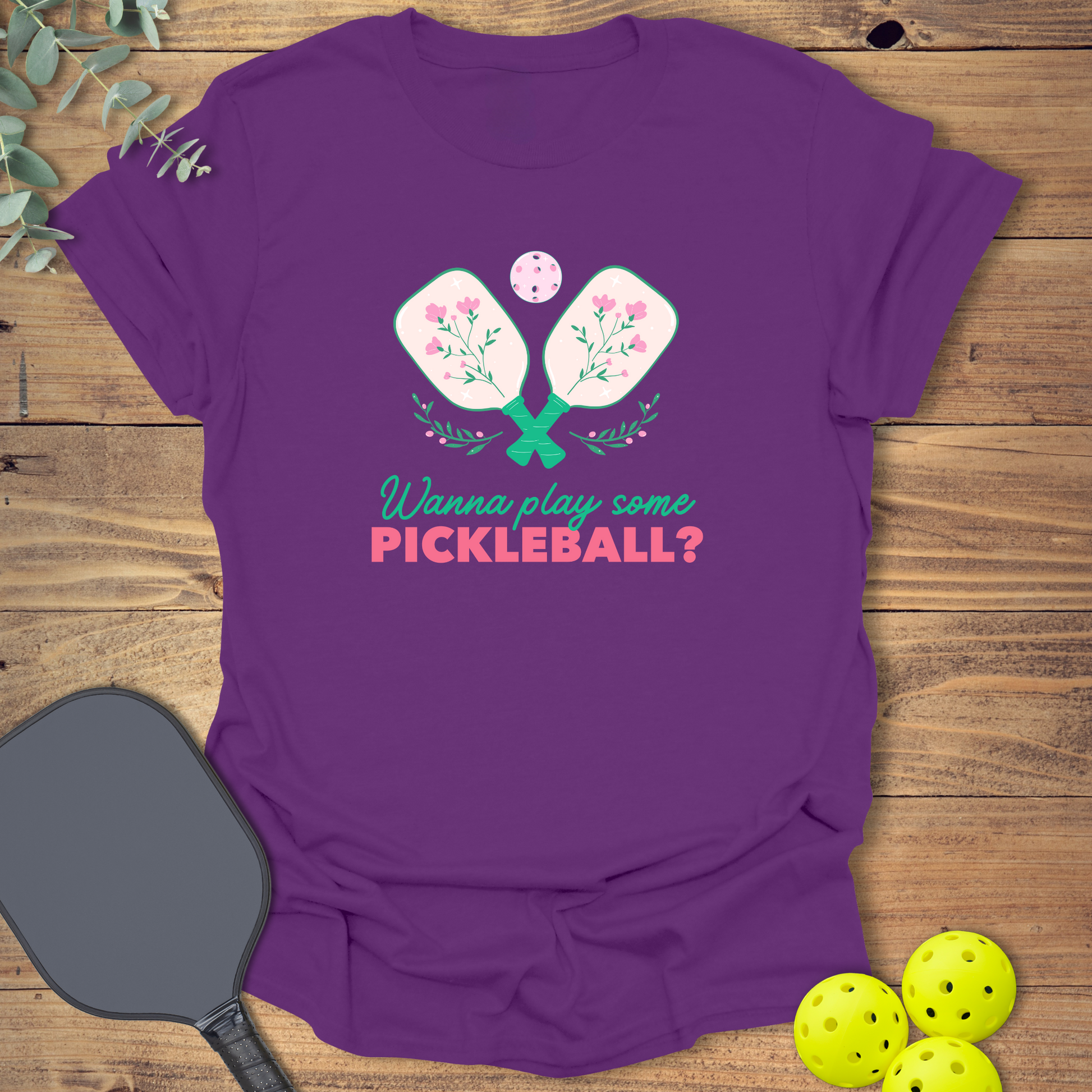 Fun pickleball t-shirt with a cute flower design in purple